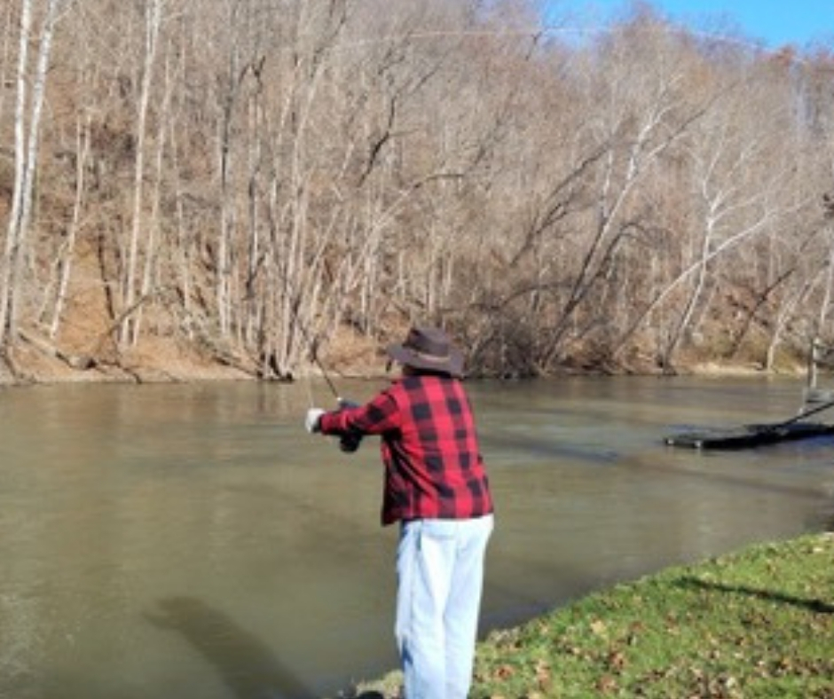 man fishing in a lake