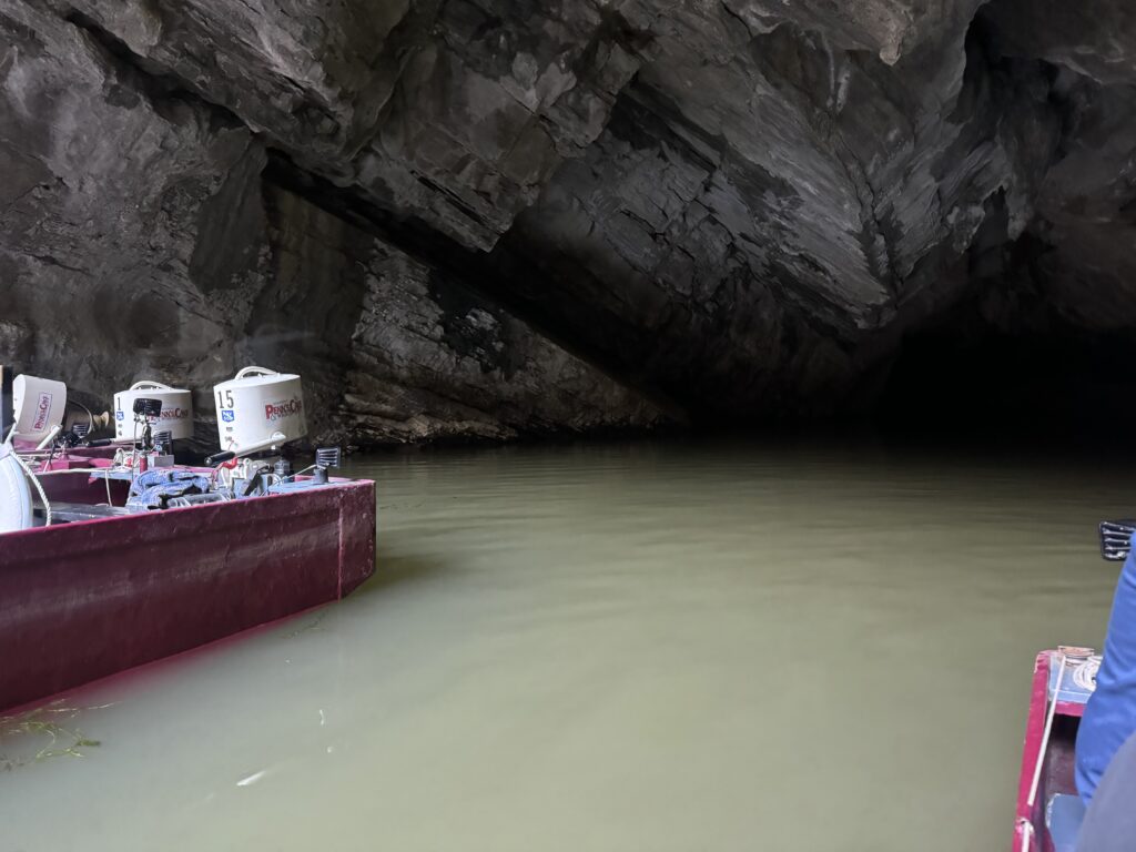 View from inside a boat, entering the cave